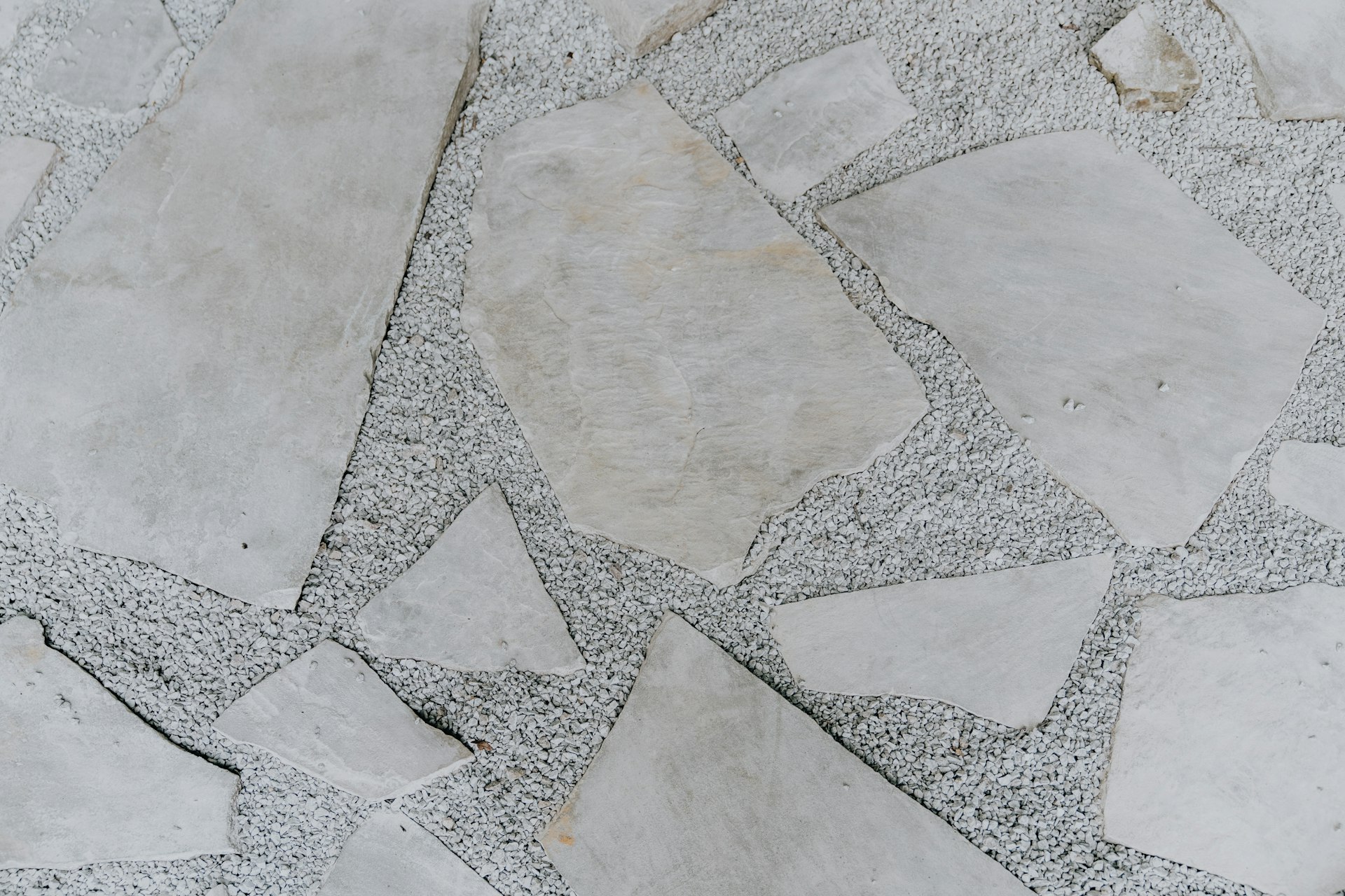 a close up of a white stone floor