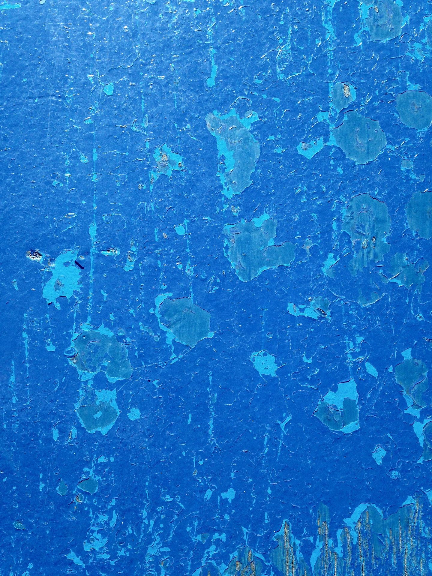 an image of a blue wall that looks like it has been painted